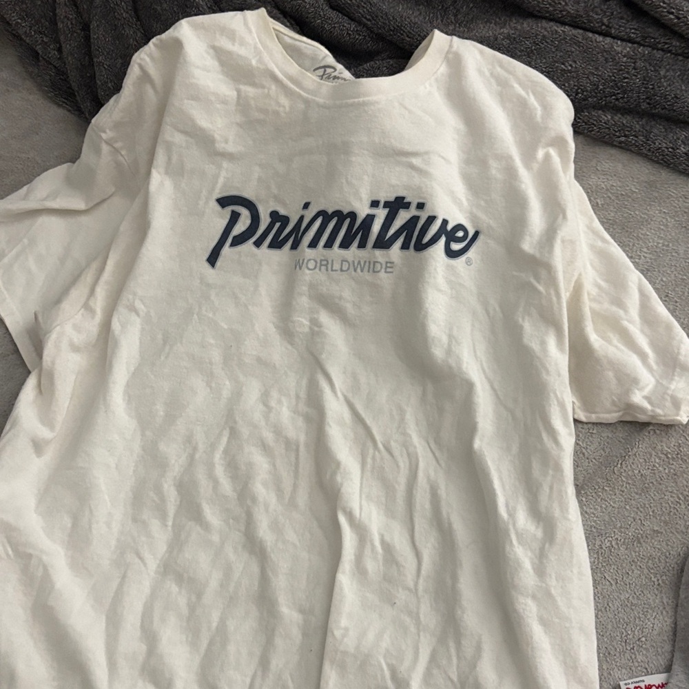 Primitive White Tee with Blue Logo